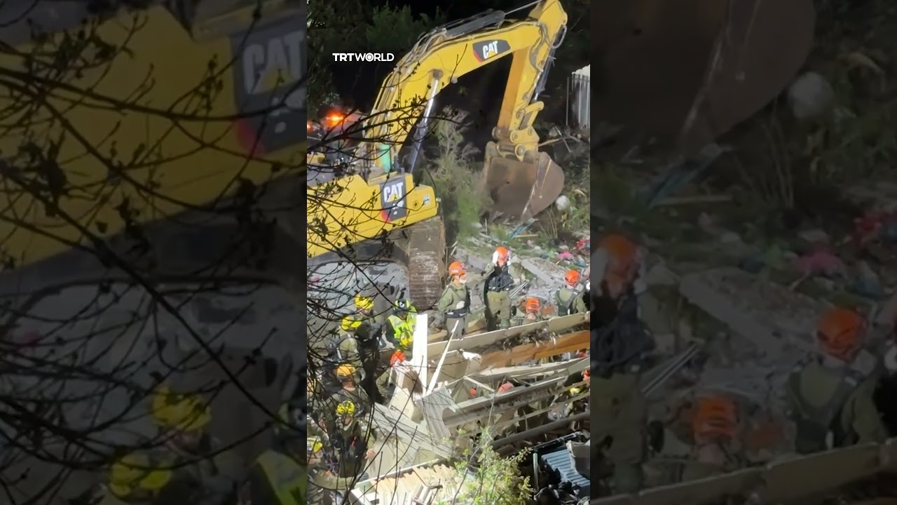 Video | Israeli rescue teams search rubble of building in Haifa after Iranian strike