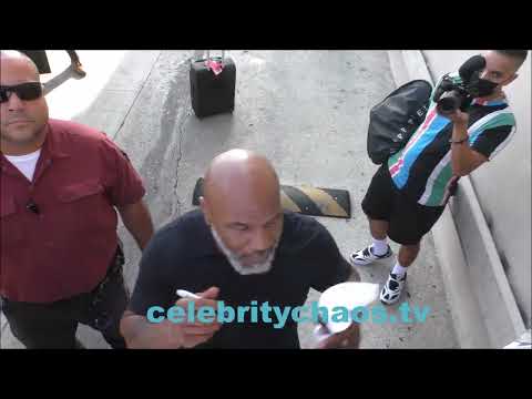 Fan makes Mike Tyson Laugh with his comment gets an autograph as a reward