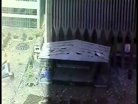 9/11 jumper smashes through glass...haunting sound of impact