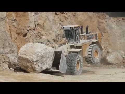 Caterpillar CAT 992K plays with a Big Stone