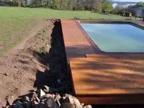 comment poser des margelles autour d'une piscine