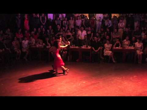  Noriko Tanada  and  Akiyoshi Tanada  are  dancing  to  the  tango  "  Volver a Sonar  "  by  Carlos di Sarli  at  Taipei Tango Festival  in  2012
