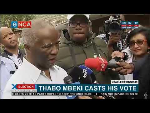 Thabo Mbeki reacts after voting