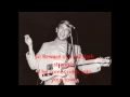 Tall Dark Stranger Buck Owens with Lyrics.