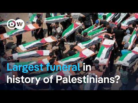 Gaza: Funeral held for 112 members of two extended families killed in Israeli airstrikes | DW News