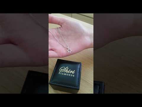 A video of Ladies Diamond 0.10ctw Petite Star of David Pendant