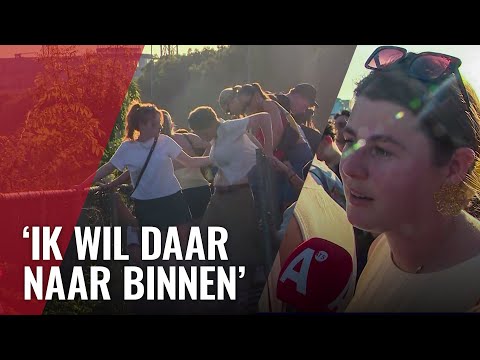 Terugkijken: festivalbezoekers breken door hekken bij rave A10