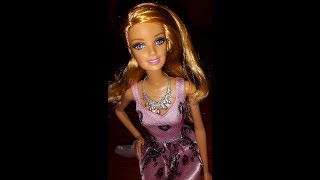 Daily un boxing barbie style doll,pink dress with hearts.