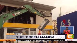 Kenyans hail the green excavator bringing buildings down