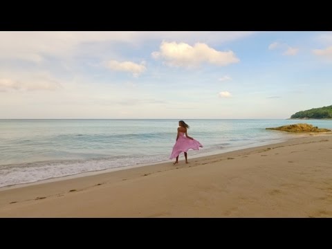 Aerial: Lonely Girl Walks on the Beach Near Waves. | Stock Footage - Videohive