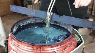 Dyeing silk in a natural indigo vat