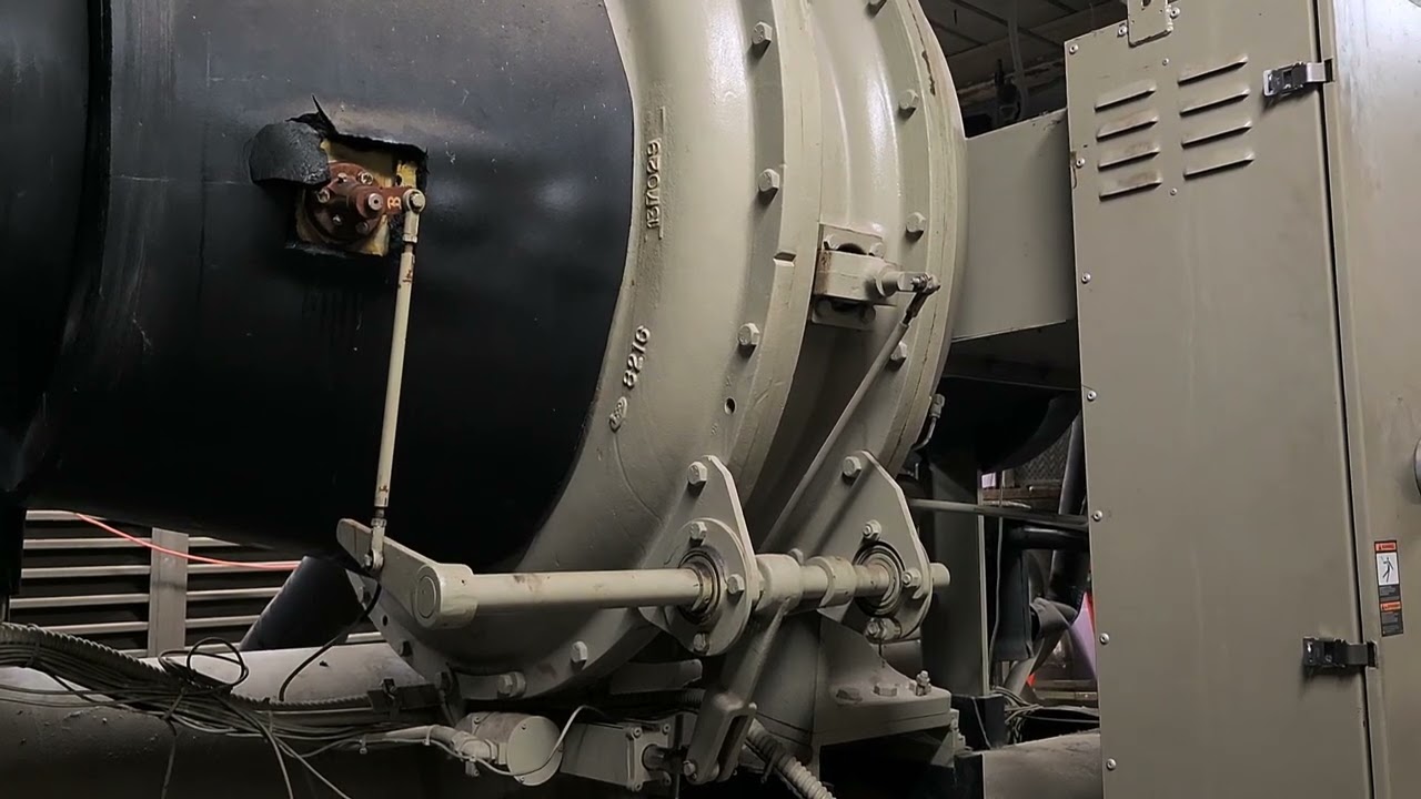 CENTRIFUGAL CHILLER IS SURGING. SHOWING HOW TO PERFORM OIL FILTER REPLACEMENT ON RTHD.