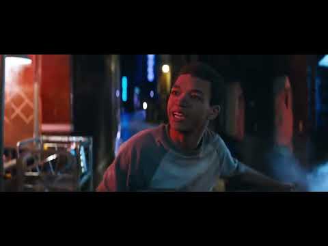 Detective Pikachu official trailer frame: Pikachu and Tim enter neon-soaked Ryme City