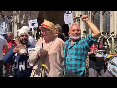 Assange supporters and Wikileaks editor in chief celebrate court ruling on extradition order