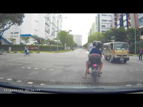 Cyclist cross at Red Man infront car at Green