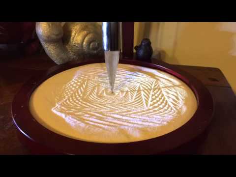 Sand pendulum in time lapse.