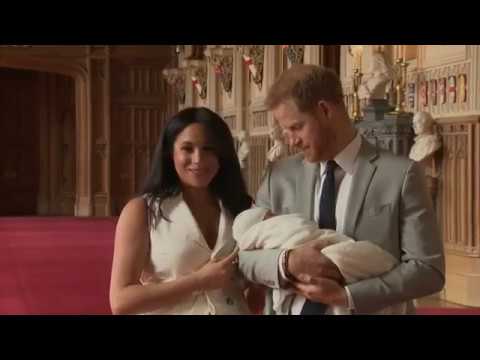 Prince Harry and Meghan introduce baby son to the world