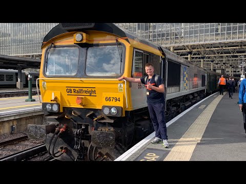 73119 and 66794 blast past surbiton with a thumper sandwiched in between. (Tones)
