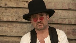 Bonnie Raitt keyboardist Jon Cleary with Honolulu, Hawaii radio host Dave Lawrence