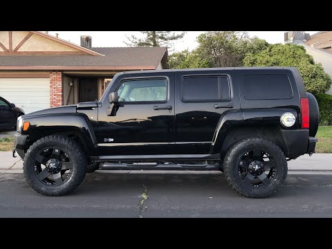 STOCK HUMMER H3 35" TIRES 20" ROCKSTAR WHEELS