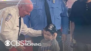 Boy who saved his family is honored by fire department