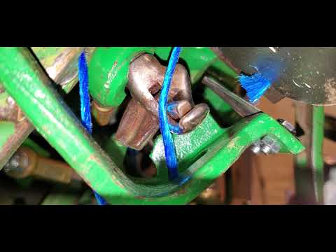 How a John Deere Knotter Ties a Knot