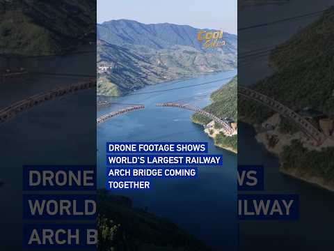 Drone footage shows world's largest railway arch bridge coming together #coolchina