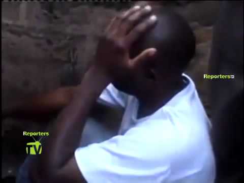 Kenyan Man Stuck Inside Another Man's Wife Due To Black Magic. - YouTube.flv