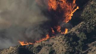 Raging California wildfires fuelled by strong winds