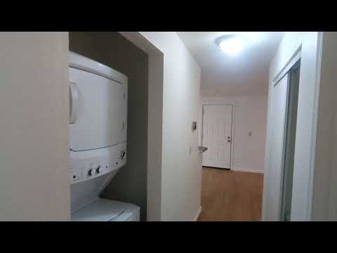 This ground floor corner-unit condo property video