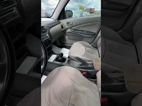 фото nissan almera ii (n16) 0