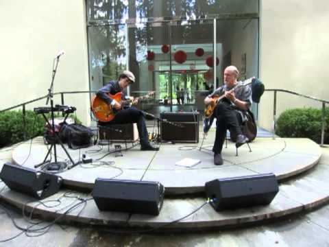 Michael Valeanu & John Scofield playing "Smile" at soundcheck.