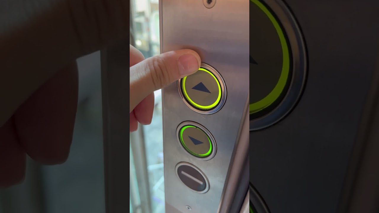 Schindler D Series button and part of the lift