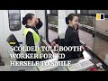 Scolded by driver, toll booth worker in China forces herself to smile