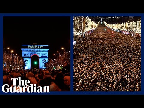 More than 1m people gather in Paris to watch New Year's Eve firework display