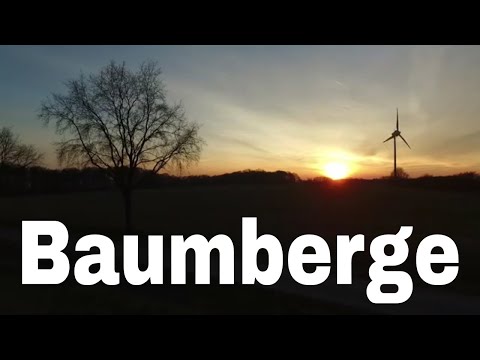 Baumberge im Münsterland bei Nottuln beim Sonnenuntergang mit Windrad