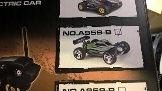 Unboxing WLToys A959-B 4WD Off Road Deutsch - English comments