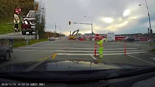 Clueless Driver Ignores Flagger, Flagger Deals With It Professionally