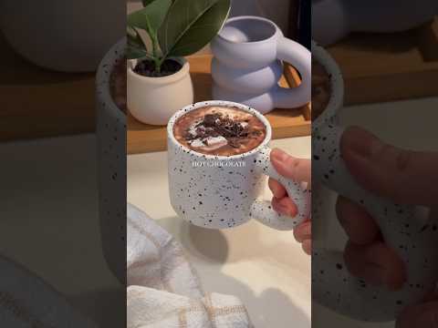 earl grey hot chocolate 🍫1 cup milk of choice1 earl grey tea bagaround 1/3 of a dark chocolate bar,
