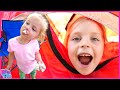 BACKYARD CAMPING And SMORES Kin Tin And Family Camp Routine Build A Tent Campfire And More
