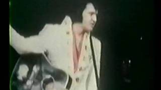 Elvis Presley : I was born About ten thousand years ago.Footage;. Video montage.