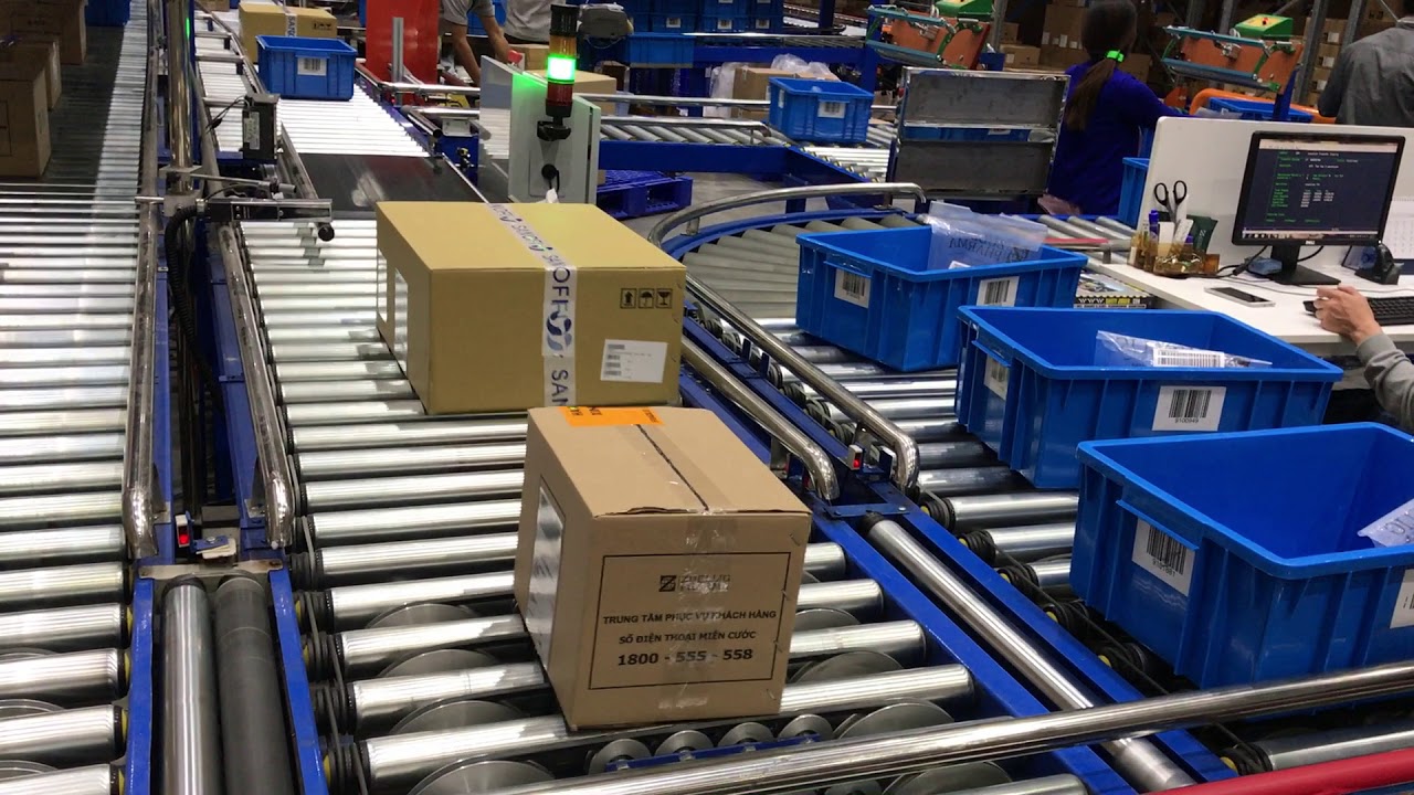 Hệ thống băng tải phân phối hàng hóa tự động
