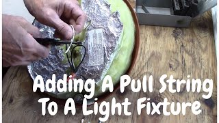 Adding a pull string to a light fixture