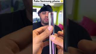 HE PAID $300 FOR A FAKE ANDROID SAMSUNG PHONE 🥲 #shorts #fake #android #samsung #apple #iphone #ios