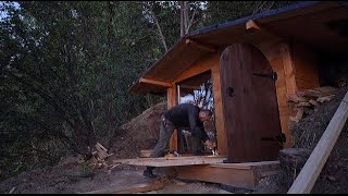 A dugout in the mountains to watch the rain, Built a fabulous house in the forest