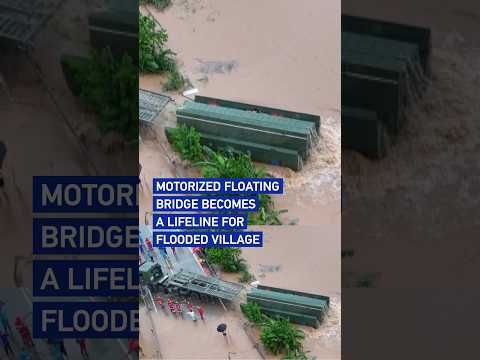 Motorized floating bridge becomes a lifeline for flooded village