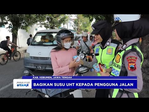 POLWAN KEBUMEN BAGIKAN SUSU UHT KEPADA PENGGUNA JALAN