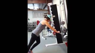 Narrow grip push ups using the Smith machine