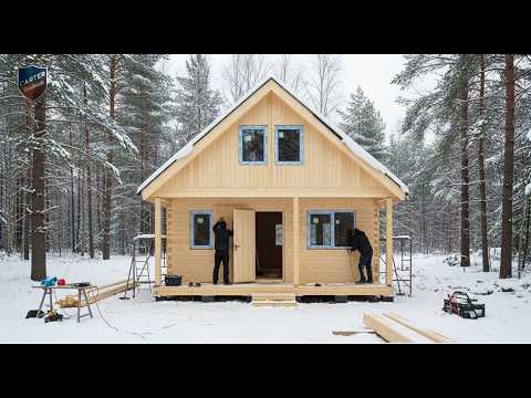 A Young Man and His Friends Build a Wooden Cabin in a Frozen Forest