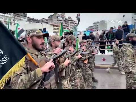 Military parades in Syria mark first anniversary of Assad's fall | REUTERS